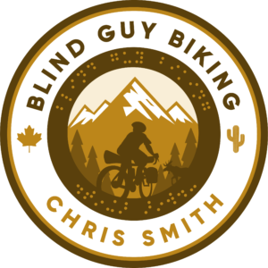 The Blind Guy Biking logo in shades of brown.